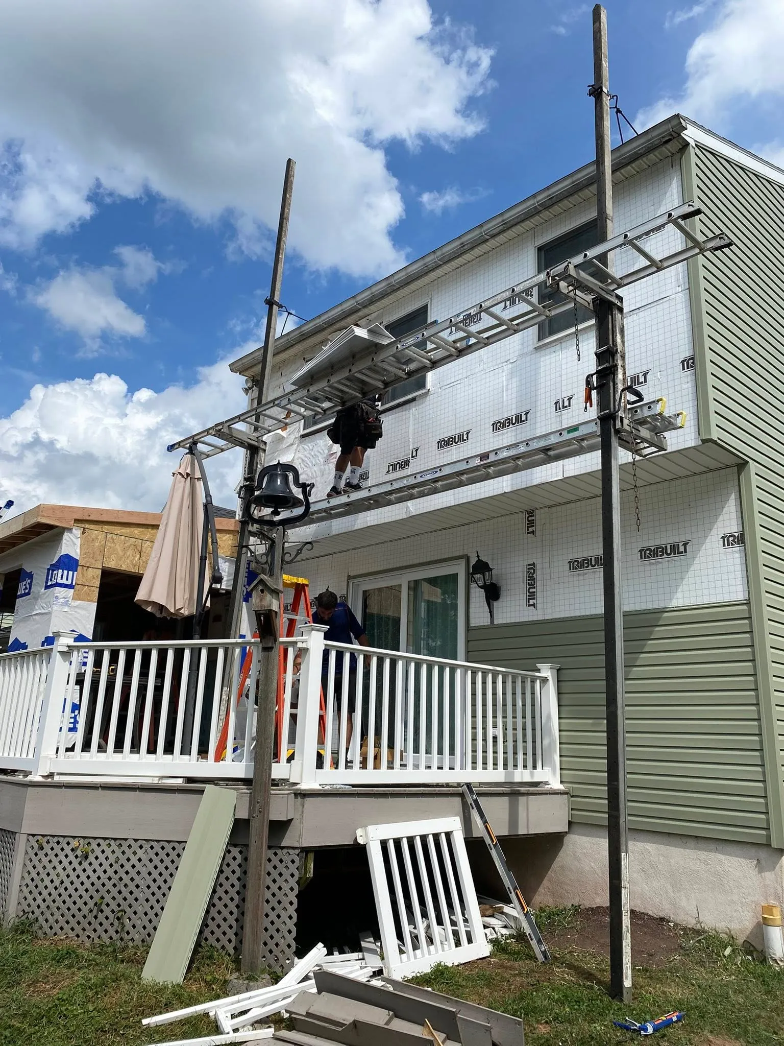 Legacy Roofing crew — siding